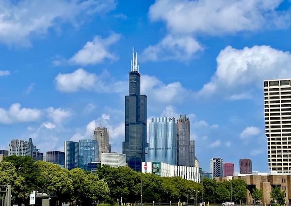 Skyscrapers and trees show the Chicago Skyline on Our Driving Tour of Chicago IL