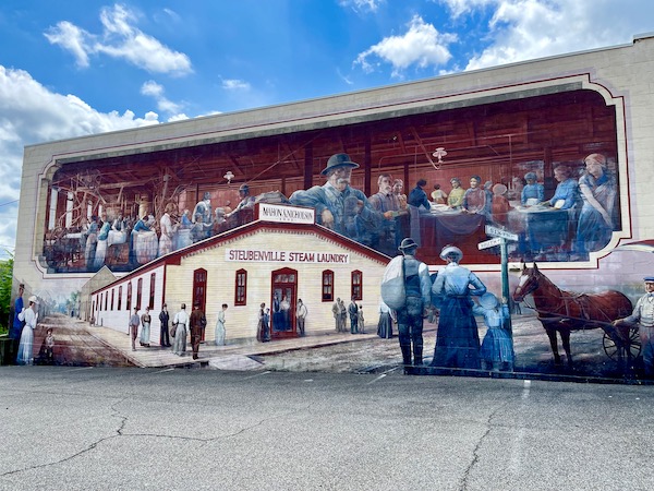 Colorful mural of a bygone era honoring Steubenville Ohio's Steam Laundry