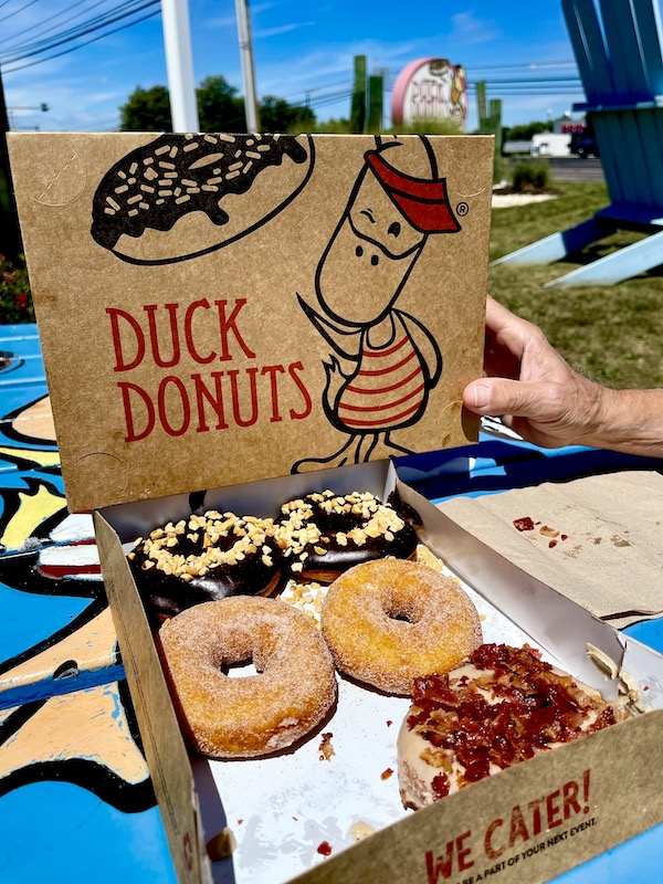 Brown Duck Donuts box filled with 6 donuts