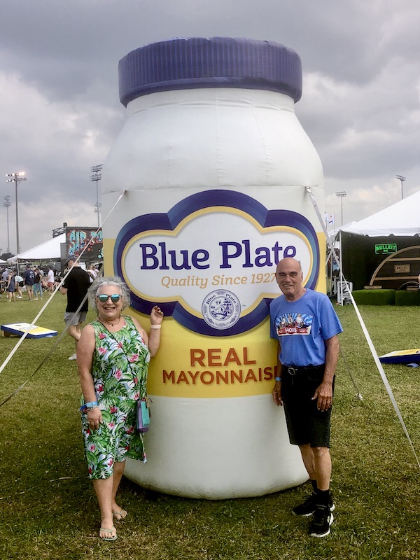 A mayonnaise jar sculpture that's twice the size of Steve and me at Hogs For The Cause NOLA