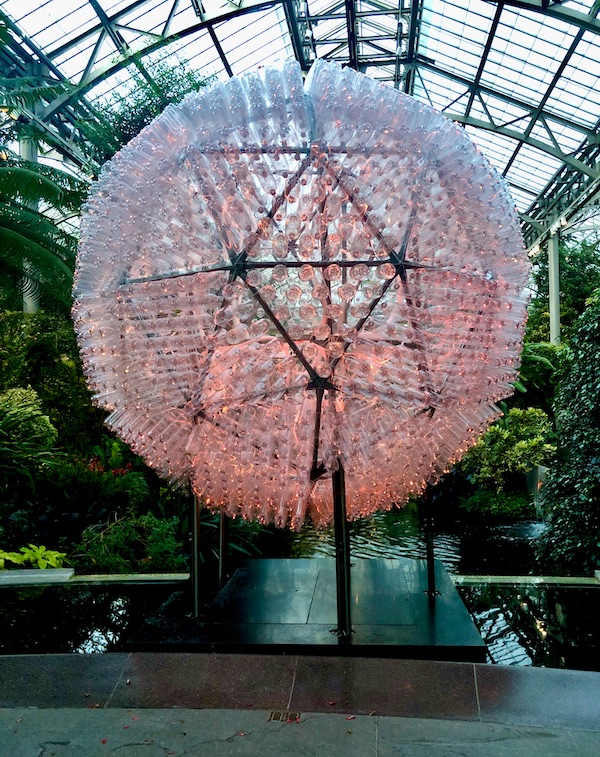 Pink globe of glass is made of lights that change color at The nighttime spectacle Light: Installations by Bruce Munro opens June 30 at Longwood Gardens. Created by English/Australian artist Bruce Munro, Light features eight installations, spanning indoors and outdoors. Highlights include the luminous Field of Light featuring 18,000 illuminated bulbs stretching across the landscape, a flamboyance of 1,000 flamingoes wading near the Chimes Tower, and C-scales, a shimmering canvas of 8,960 CDs in the Exhibition Hall that reflect colorful projections inspired by Longwood’s water gardens.