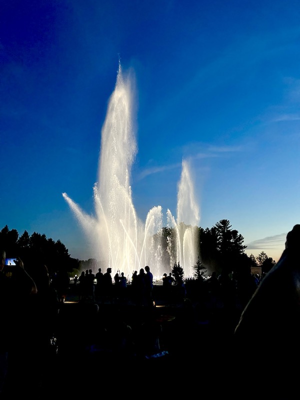 Tall fountains of water appear to dance in the night sky at The nighttime spectacle Light: Installations by Bruce Munro opens June 30 at Longwood Gardens. Created by English/Australian artist Bruce Munro, Light features eight installations, spanning indoors and outdoors. Highlights include the luminous Field of Light featuring 18,000 illuminated bulbs stretching across the landscape, a flamboyance of 1,000 flamingoes wading near the Chimes Tower, and C-scales, a shimmering canvas of 8,960 CDs in the Exhibition Hall that reflect colorful projections inspired by Longwood’s water gardens.