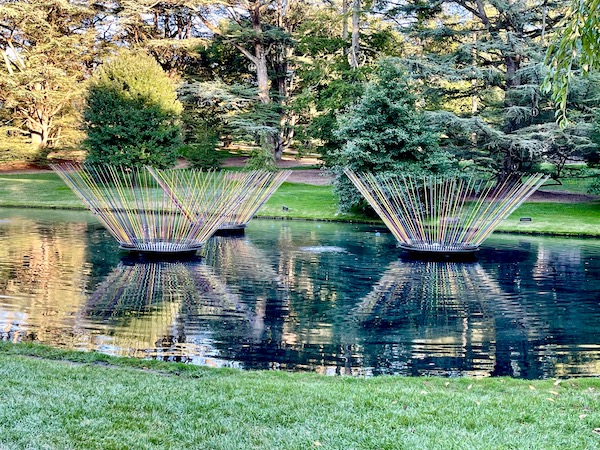 A trio of colorful floating sculptures at Longwood Gardens Kennett Square PA