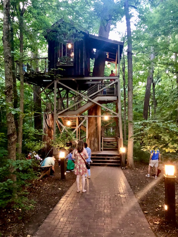 Treehouse lit up as the sun goes down at Longwood Gardens Kennett Square PA