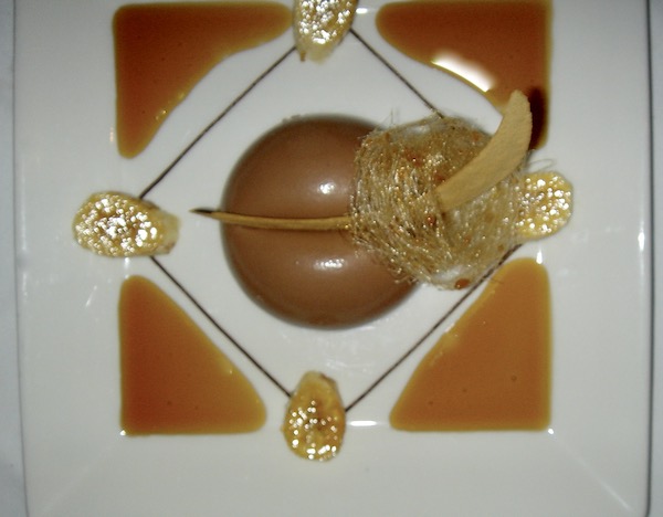 Artful plate of dessert with chocolate and gold leaf on an RV trip to Charleston SC