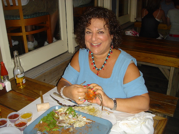 Me eating hard shell crab at a restaurant on our first RV trip.