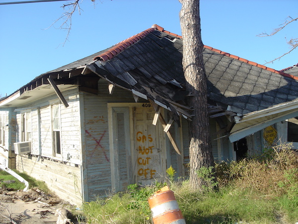 Roof collapsed and house demolished from floods of Katrina in 2005.