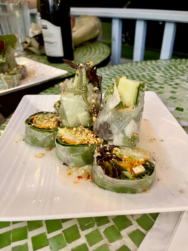 Fresh Spring Rolls filled with vegetables on a large platter, in another place for Good Eats in the Big Easy