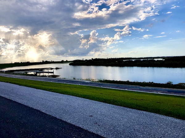 Walking path past outer bands of Lake Okeechobee Florida
