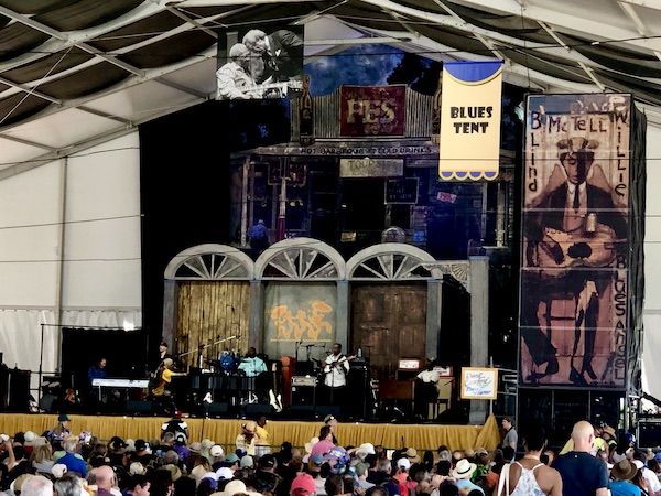Musicians performing in the Blues Tent at Jazz Fest