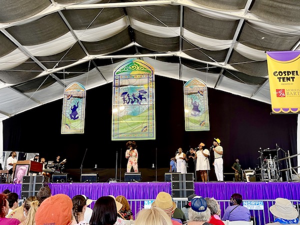 Another Gospel group performing on stage at the Gospel Tent