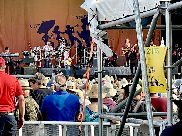 Santana and Band performing on stage at New Orleans Jazz and Heritage Festival
