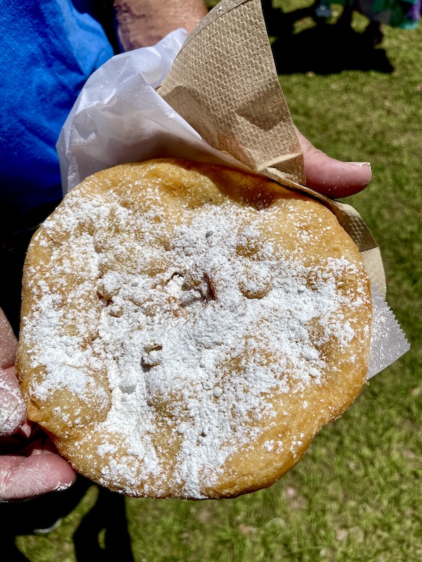 Displaying our luscious Native American Fry Bread which is a large fried disk of dough covered with powdered sugar