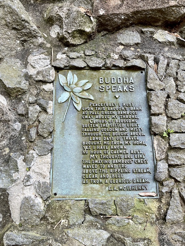 Plaque with poem about the buddha that was written by E.A. McIlhenny