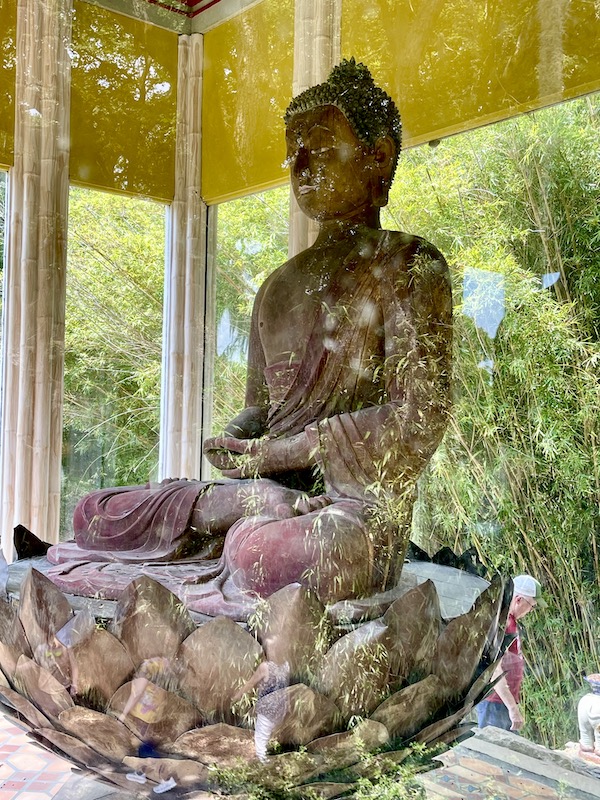 900 year old buddha in a shrine in Jungle Gardens, part of the Tabasco Avery Island Experience
