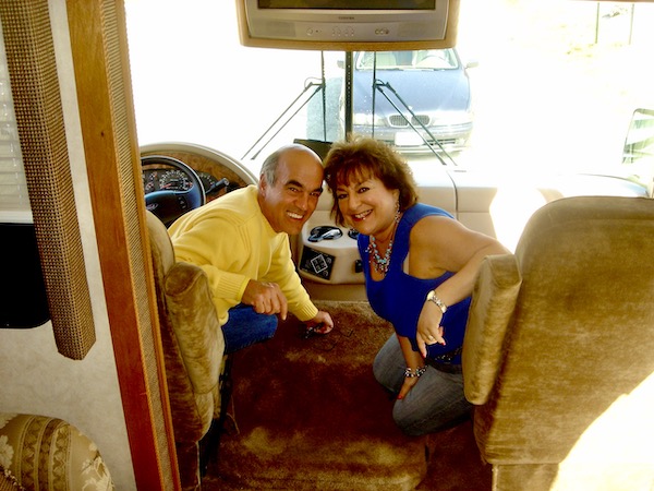 Guide to Full Time RV Living Part 1 with us in the driver and passenger seats of our first RV