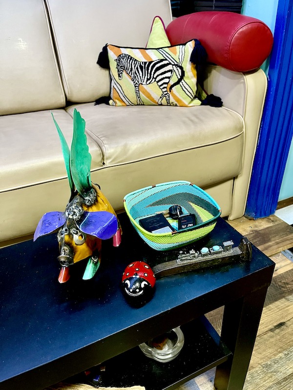 Black table with artful items display are a way to make our RV feel like home