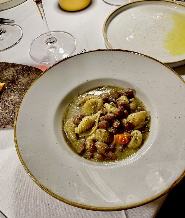 Shallow soup bowl with wide rim holding Pasta e Fagioli Genovese from Pasta And... Margate Florida