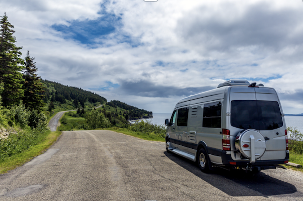Camper Van on the road is another example of What Type of RV is Best for You?