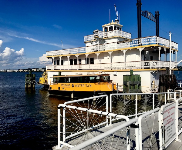 White and yellow large water taxi on the Potomac River is part of my 3 Years RVing Year 1 Recap