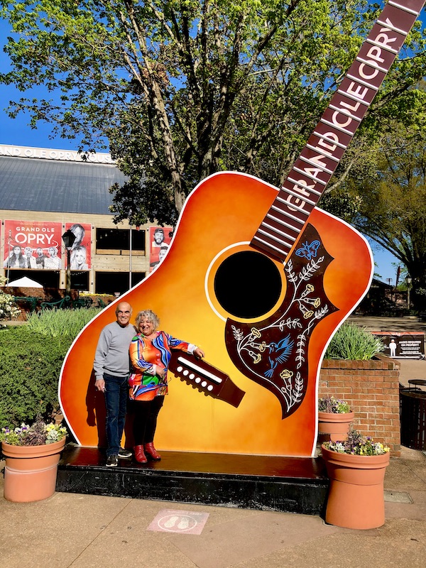 Steve and I standing in front of an enormous guitar at Opryland in Nashville