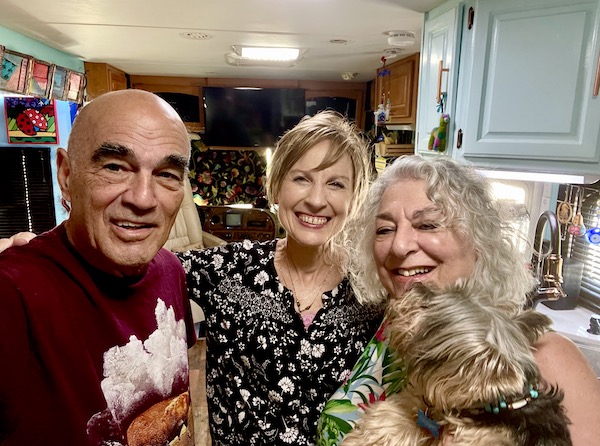 Steve, Sondra, Me and Hershi inside our RV.