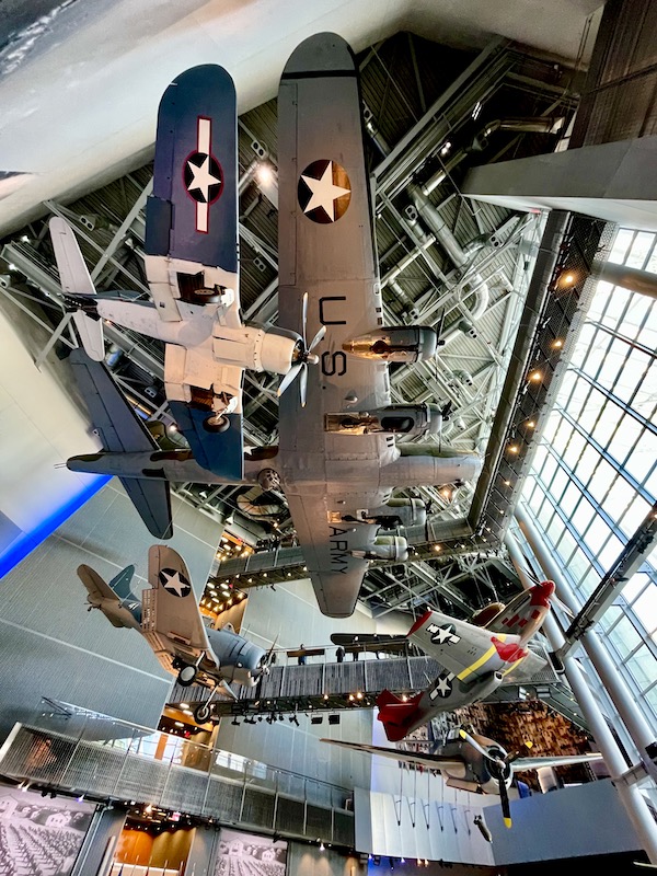 Planes hanging from the ceiling on display at the WWII Museum. Part of my 3 Years RVing Year 3 Recap