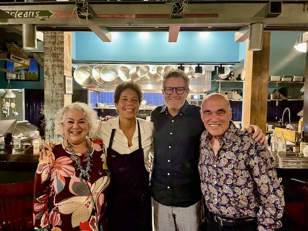Steve and me with Nina Compton and Larry Miller in front of their bar and open kitchen. Part of my 3 Years RVing Year 3 Recap