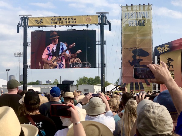 Jumbotron with Santana playing guitar and crowded stage area. Part of my 3 Years RVing Year 3 Recap