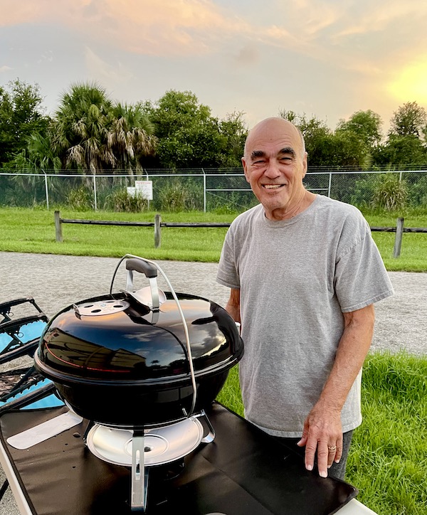 Steve standing next to his brand new charcoal grill. Part of my 3 Years RVing Year 3 Recap