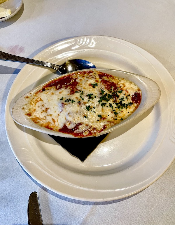 Stresa Italian Restaurant WPB FL gratin dish of stuffed eggplant rolls, red sauce and cheese.