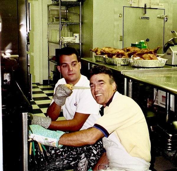 Happy Birthday to the One That I Love with our son who's pretending to baste Steve as he checks Thanksgiving turkeys in the oven at our commissary.