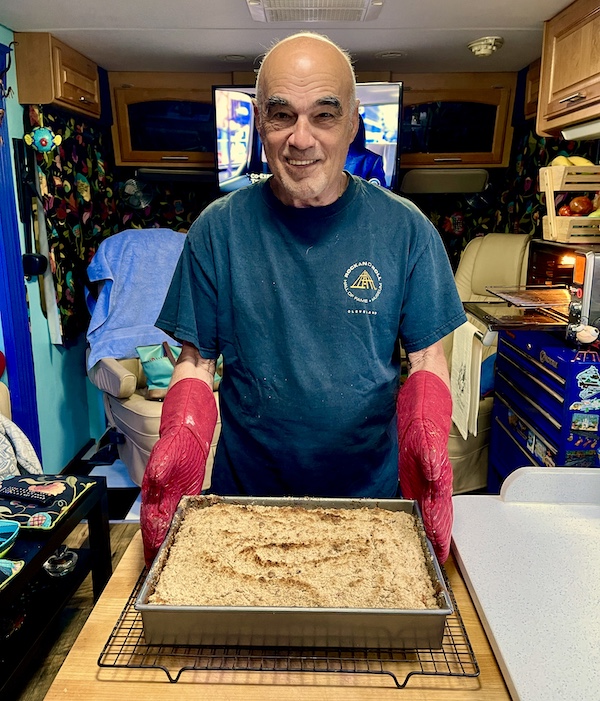 Happy Birthday to the One That I Love as he presents a cake that he baked, just out of the oven.