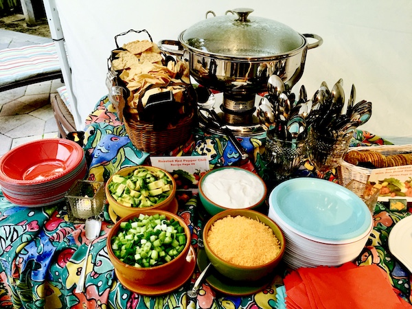 I Love to Feed People at a taco station with all of the accoutrements