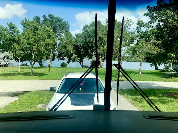 Seen through our RV windshield the view of Lake Osbourne at John Prince Park Campground Lake Worth FL