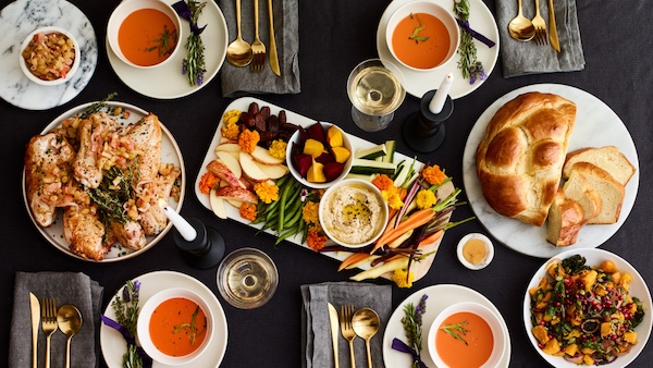 Table set with food similar to our Shabbat Dinner November 10 2023