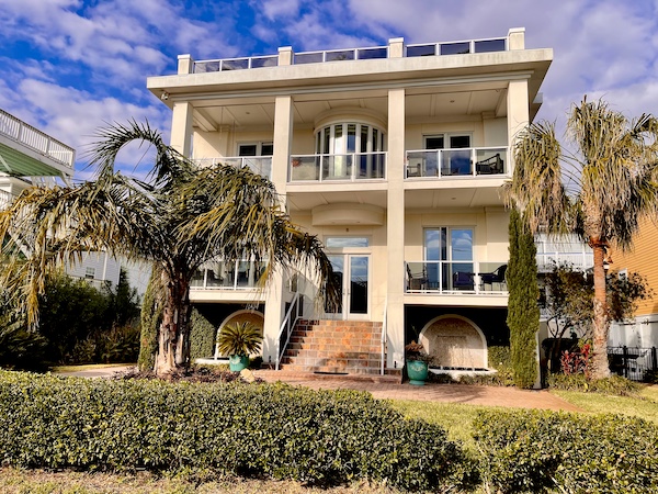 Three story house with garages and balconies on Tybee Island Georgia