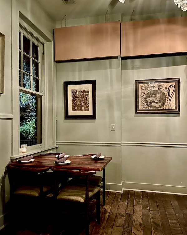Five and Ten Athens GA dining room with sage green walls and wood tables
