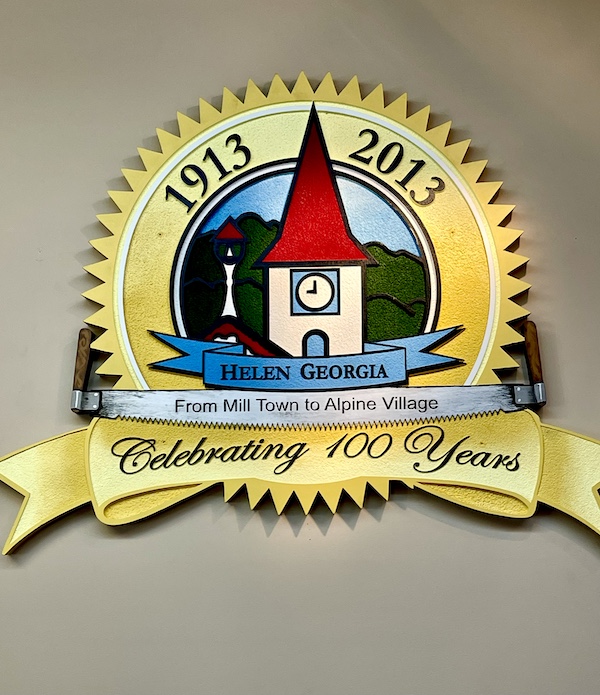 Holiday Season in Helen Georgia with an emblem celebrating 100 years