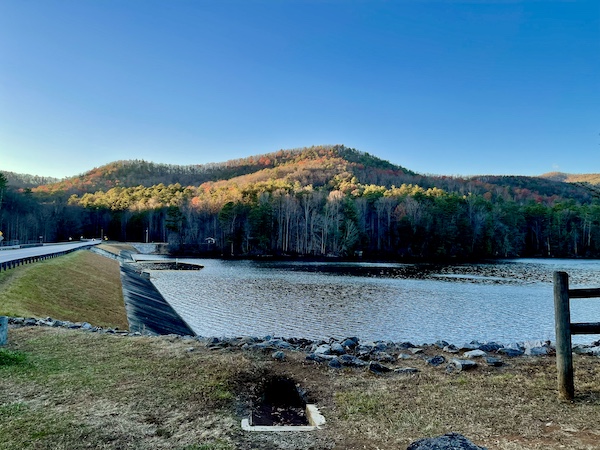 Holiday Season in Helen Georgia by a lake with tree covered mountains