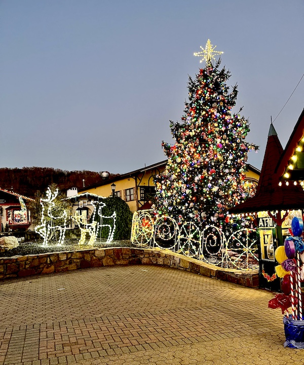 Holiday Season in Helen Georgia with large Christmas tree and lt reindeer