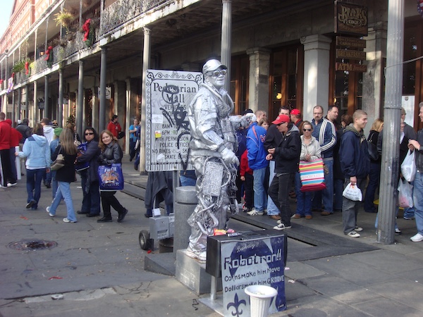 Jackson Square New Orleans with human statue in all silver.