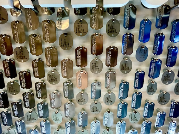 Close up of the dog tags on the entry wall at the Liberation Pavilion at National WW2 Museum