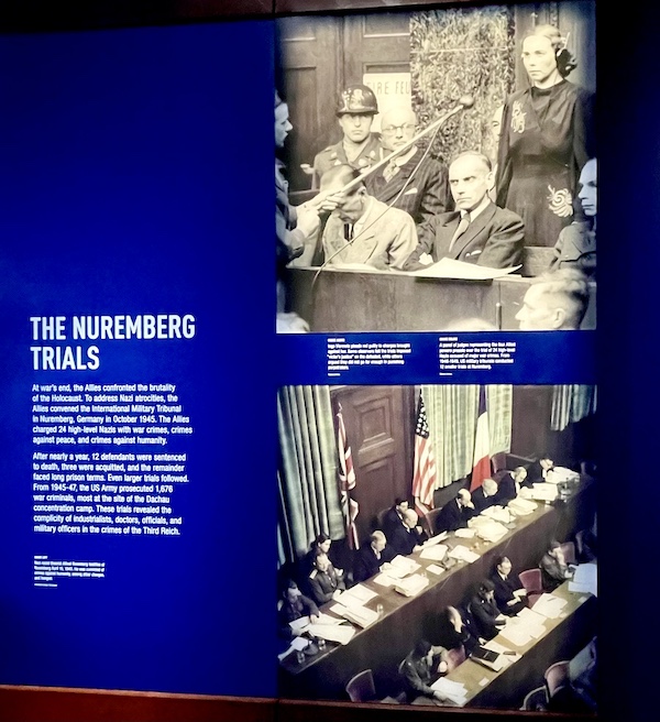 Information about the Nuremberg Trials at the Torn roof exposed to the sky with WW2 planes seen flying overhead