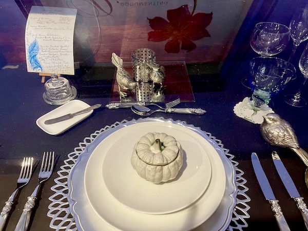 Elegant table setting with white and blue dishes at SoFab NOLA is So Fabulous!