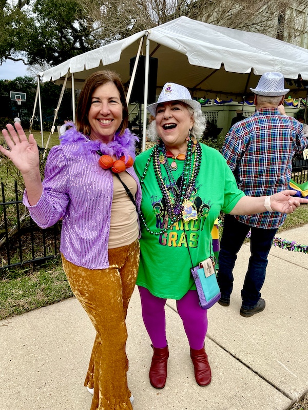 Me and Holly waving and enjoying the 52 Year Mardi Gras Tradition