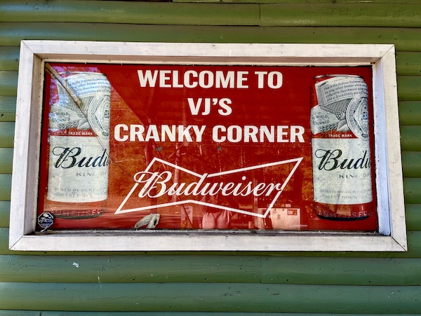 Red and white Budweiser sign welcomes you to Cranky Corners on the way to and from Global Wildlife Center Folsom LA