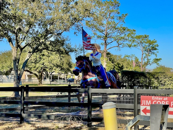 Woman on a horse statue with American flag in Folsom near Global Wildlife Center Folsom LA