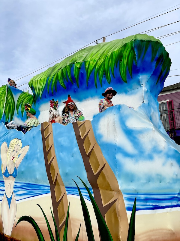 Our First Mardi Gras Parade included a float that looked like an island paradise