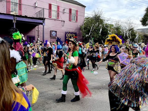 Our First Mardi Gras Parade complete with colorful fun costumes on parade participants